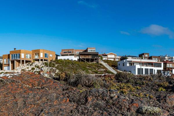 SOLE MANDATE:   Proud to offer this rare opportunity to own one of the the last beachfront vacant stand in the heart of Yzerfontein.  ...