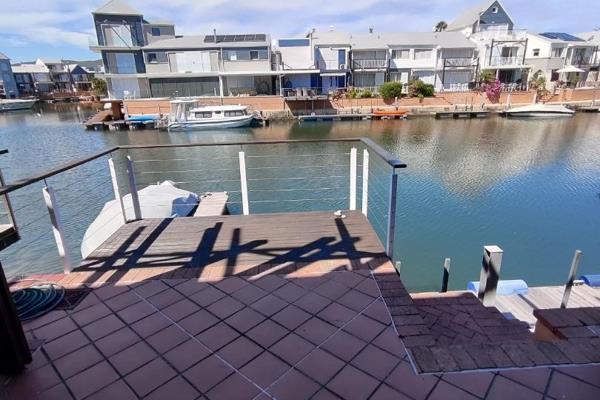 Sole Mandate --- Located at the Knysna Quays Waterfront Private Marina is this 3 bedroom 2 bathroom home is complimented by quality ...