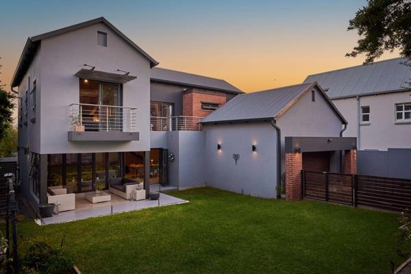 Modern and neat, this lovely family home has clean lines and an artistic flair, a ...