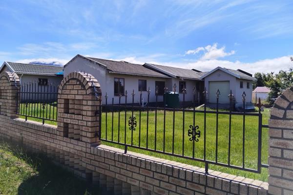 This property in Kokstad Extension 7 is a great find with a lot of potential! With a ...