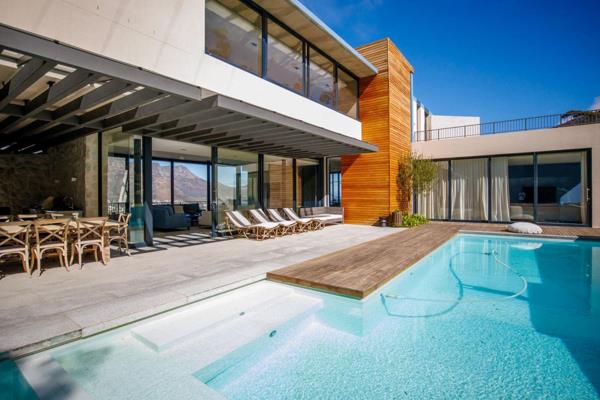 Welcome to this magnificent Stefan Antoni designed home set in Kerzner Estate, Hout Bay, featuring top quality finishes and state of ...