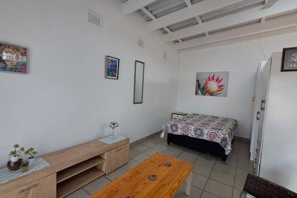 This neat, furnished bachelor unit features a separate shower and toilet each, with an open plan bedroom and living area. The kitchen ...