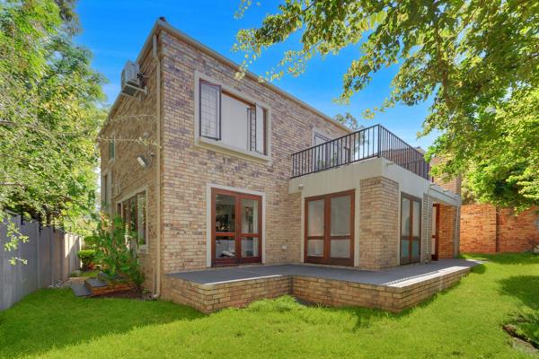 A gated garden entrance leads you to the front door of this delightful and low-maintenance family home. 

Enter the home into 3 ...