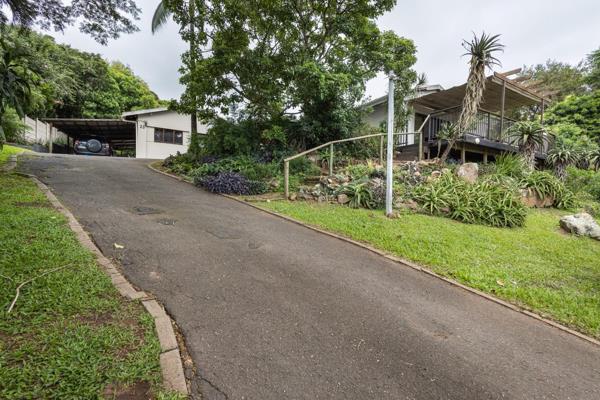 Welcome to a home that redefines family living, nestled in the peaceful heart of Forest Hills. This freestanding gem perfectly combines ...