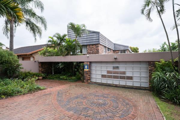 A Grand Entrance to the Lounge &amp; Bar Area
As you step into this exquisite double-storey home in Reservoir Hills, you&#39;re ...