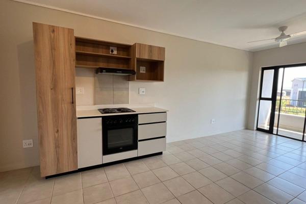 Be the first to call this apartment your Home!

Open plan kitchen (appliances not included) with lots of cupboard space, washing ...