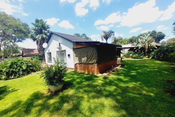 This lovely family home on a corner stand in Daspoort can be your next ...