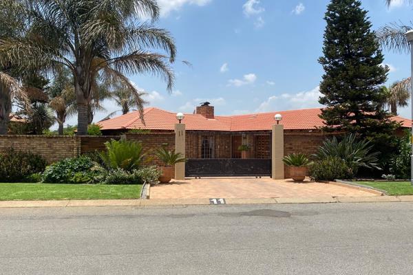 Nestled in the sought-after, secure estate of Sunward Park, this stunning 4-bedroom home ...