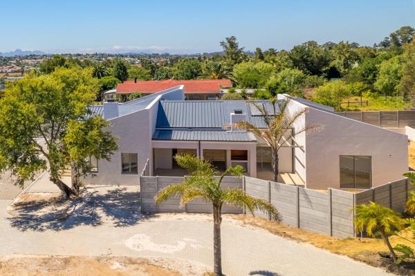 This single-story entertainer&#39;s home is nestled within a small gated community of only six homes, offering both exclusivity and ...