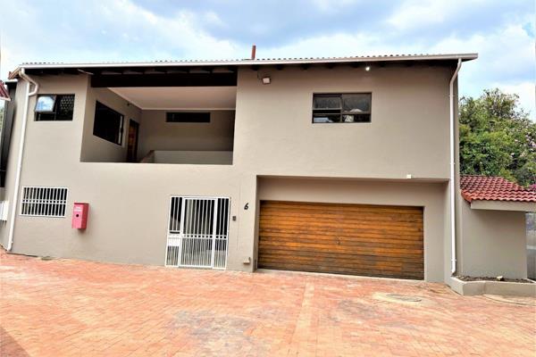 Stunning double storey renovated  cluster  in the process of being painted throughout ...