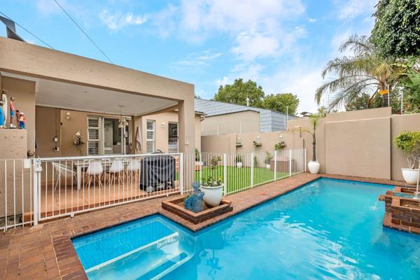 Step into a realm of radiant brightness as you enter this exquisite open-plan lounge, dining, and family room, all adorned with ...