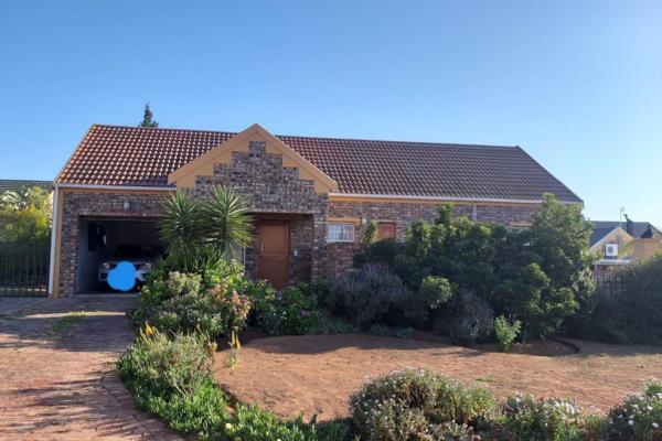 Security Complex. Low-maintenance, face brick, three bedrooms, two bathrooms, open-plan house with one garage and a neat water wise ...