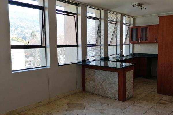 Spacious bachelor apartment in The Towers, Central Paarl. 
Manned security at entrance and access control. Intercom system to the ...