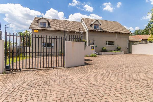 Prime Location in Douglasdale: This property offers business rights, perfect for those looking to operate a home-based ...