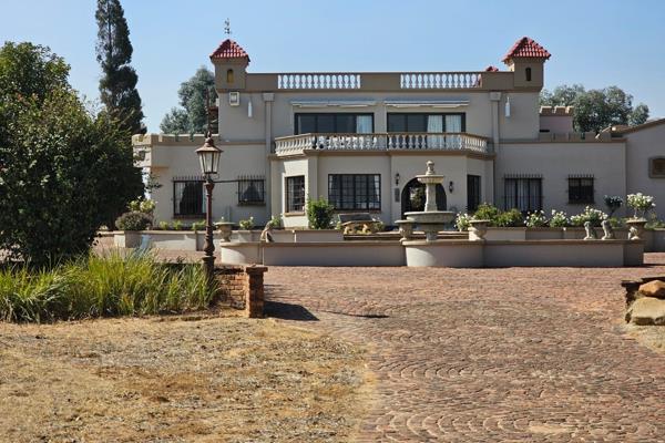 Discover this timeless double-storey masterpiece on the private shores of the Vaal Dam. The main house features 4 spacious bedrooms, 3 en-suite bathrooms, a guest toilet, and an open-plan living area with a modern kitchen. 

Enjoy seamless indoor-outdoor living with a ...