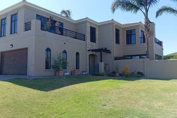 You are welcomed into this gracious well kept home in a secure gated estate.  The double storey home offers 3 modern bedrooms upstairs. ...