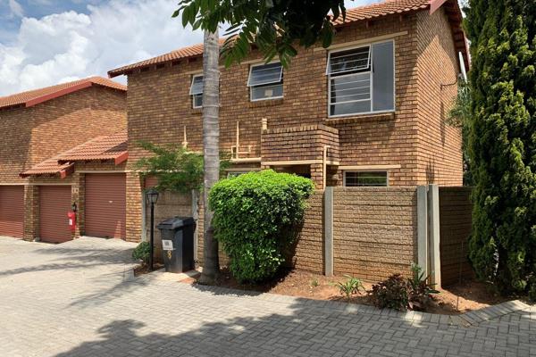 This townhouse is located within a well-maintained, secure estate that features 24-hour security.

The open-plan lounge and dining area ...