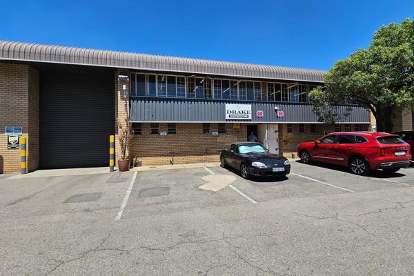 This unit comprises one large open-plan office setting, ground ablutions with a small kitchenette area, and one large roller shutter ...