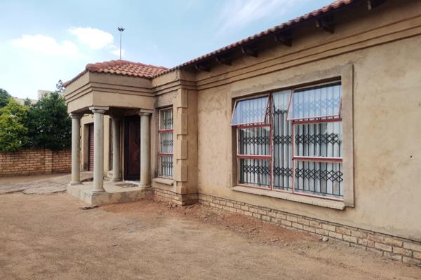 The house is a very big house with a very big yard, well secured with a wall and gate., The house is a 3-bedroom house with two ...