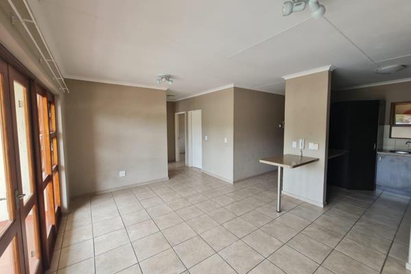 Upon entering the apartment, you will be greeted by a spacious open-plan living and dining area that seamlessly connects to the ...