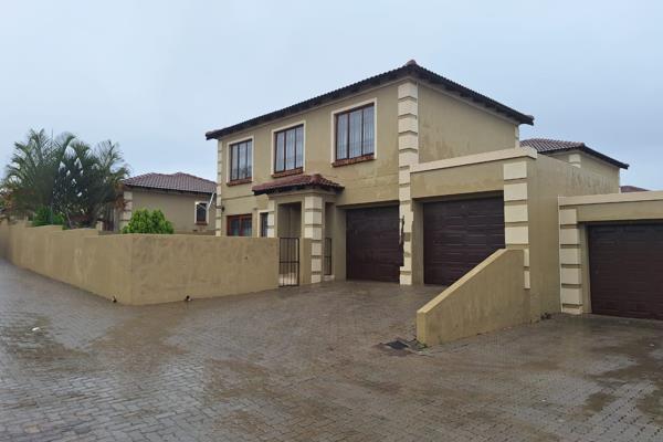 This Modern Residence Offers:

- An Open plan living environment which seamlessly flows from the dining, living, to the kitchen ...