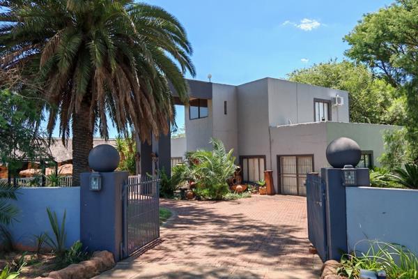 Own a large 5 bedroom house on a 23.3ha fenced farm bordering the Boekenhoutskloofspruit on the one side, and Dinokeng Game Reserve ...