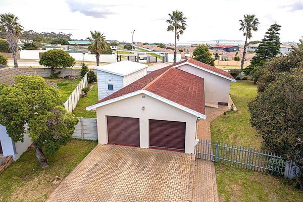 ...Watch Video Attached...
In the heart of the residential area of Heiderand, Mossel Bay, lies this great three bedroom family home ...