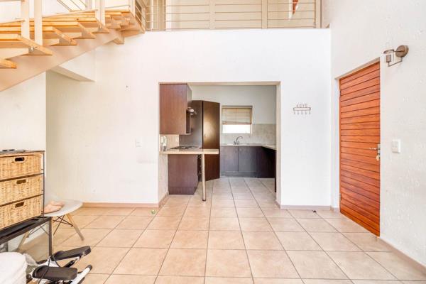 This charming first-floor loft apartment offers a blend of comfort, style, and convenience. As you step inside, you&#39;ll be welcomed by a bright and spacious open-plan dining and kitchen area, designed for both entertaining and relaxed living. The kitchen features ample ...