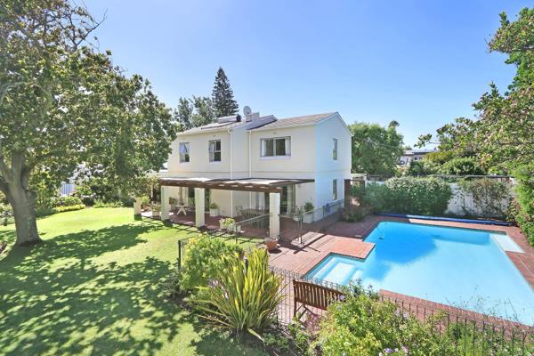 This wonderful family home in sought after Dennendal, Tokai is a must view. Set in a ...