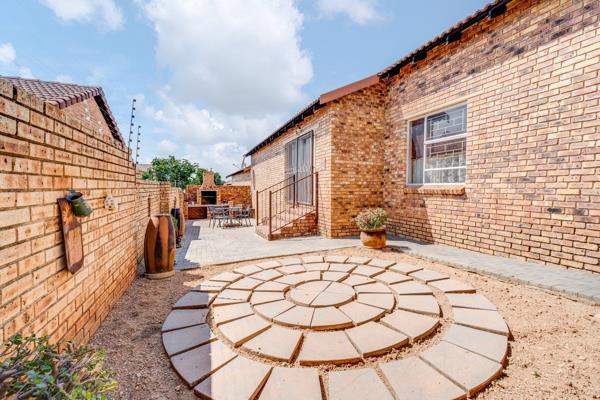 Uncover the charm of this 3-bedroom townhouse! This property has a solar system.  Adorned with carpets in the bedrooms and sleek tiles ...