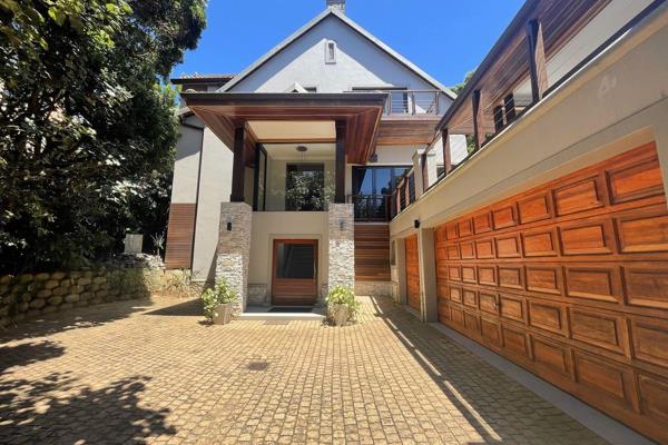 This stunning home is nestled in a tranquil cul-de-sac within the prestigious Zimbali ...