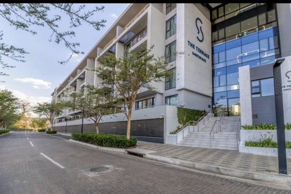 Welcome to this stunning 2 bedroom, 2 bathroom apartment located on the 1st floor of Sandton Gate.

The open plan lounge and dining ...