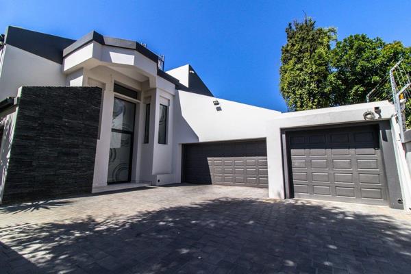 This sophisticated three-bedroom home, situated in a secure road closure in Bedfordview, offers a seamless blend of contemporary ...