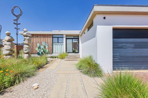 Welcome home!
Discover a sanctuary of modern luxury with this breathtaking 3-bedroom, 3.5-bathroom home—a striking fusion of concrete ...