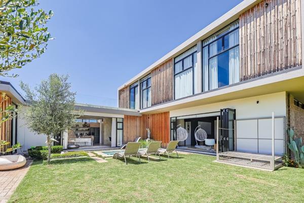 Welcome home!
Discover a sanctuary of modern luxury with this breathtaking 3-bedroom, 3.5-bathroom home—a striking fusion of concrete ...