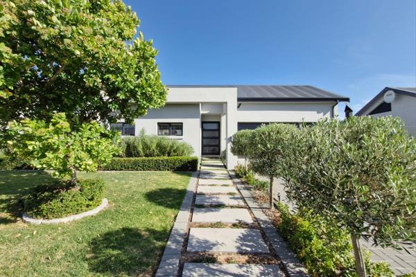 Experience indoor-outdoor living at its finest in this modern, furnished home. 
Located in a secure estate in Paarl South, with the ...