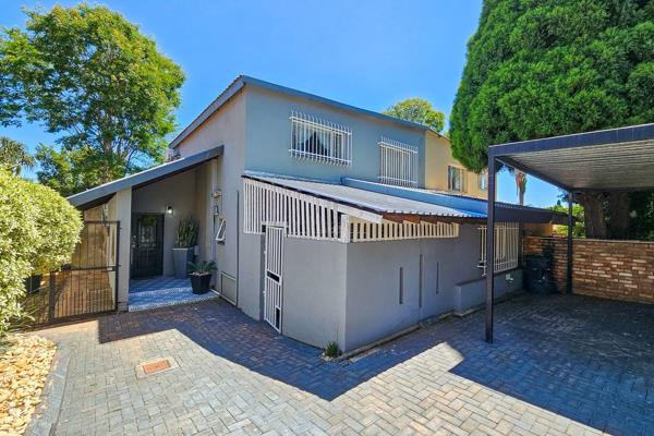 The property boasts spacious, open-plan living areas that seamlessly flow out to a sunny patio and built-in braai, providing a perfect ...