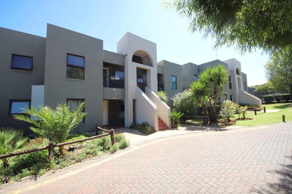 Entrance, open-plan lounge, and dining area leading to the balcony
Kitchen with breakfast nook, granite tops and sufficient cupboard ...