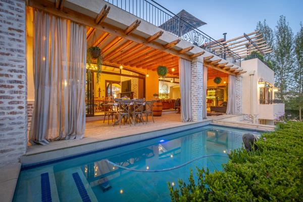 This magnificent home transports you directly to a beautiful Villa in Europe, but you ...