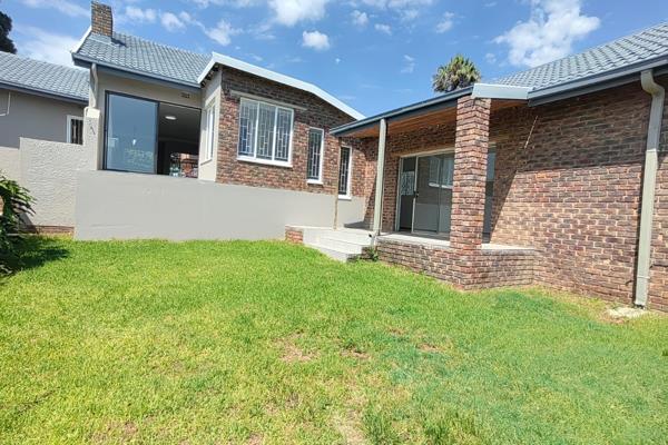 This stunning renovated family home offers modern finishes, ample space, and a prime location close to top schools, shopping malls ...