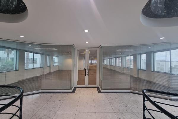 A spacious 1,954 sqm office space is available for lease at Grosvenor Crossing, offering ...