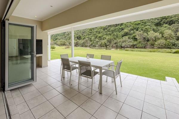 This spacious furnished double storey 4 bedroom 3 bathroom river front home.
The ground floor offers open plan kitchen, dining and ...