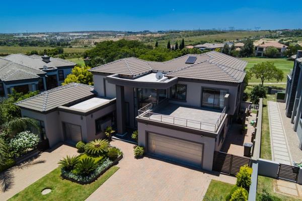 This recently constructed, modern home is nestled on the fairway and boasts a sleek, contemporary design with all the latest features. ...