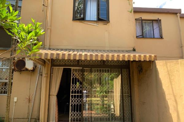 What a lovely welcome you feel in this unit, its neatness and paved walkway with different green plants along as you enter the front ...