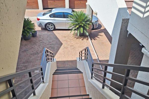 Enjoy breathtaking views from this delightful upstairs unit in the heart of Northcliff!  ...