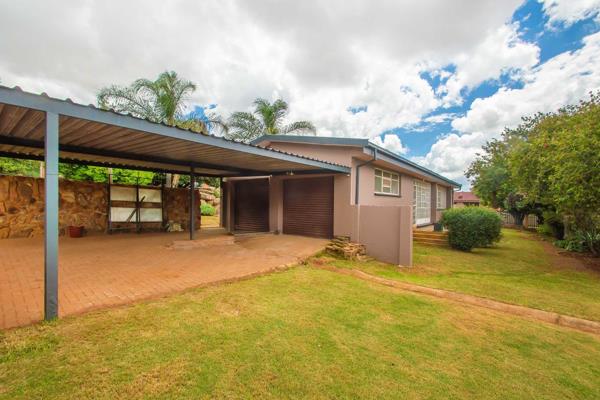 This well-appointed family home in the heart of Monument, Krugersdorp, offers ...