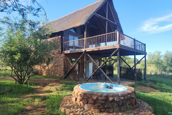 Exquisite Thatched Home in Bushwillow Estate with Vaalkop Dam Views

Nestled in the ...