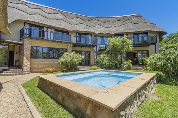 Situated in the prestigious Phezulu Estate, this 518 m&#178; architectural masterpiece on a 1,543 m&#178; stand offers the perfect ...