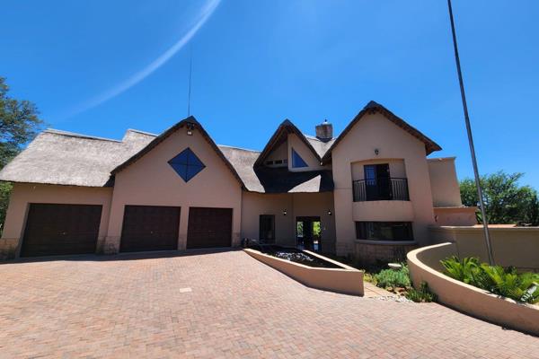 Nestled in the sought-after Leeuwfontein Estate, this stunning 4-bedroom, 4-bathroom home offers the perfect blend of luxury, privacy ...