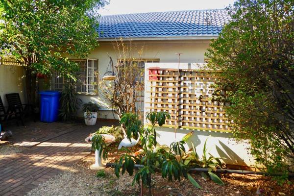 Newly tiled and painted, this neatly maintained townhouse offers a perfect blend of ...